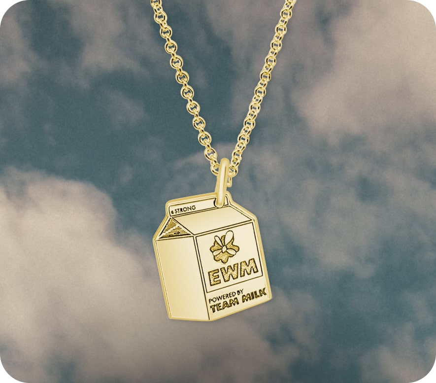 Every Woman's Marathon milk carton charm on necklace.